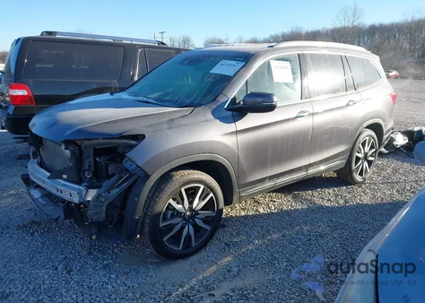 2022 Honda Pilot Touring 7-Passenger z USA, uszkodzony, nr VIN 5FNYF6H61NB024782